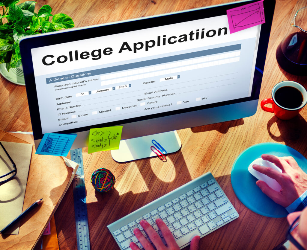 College Application website on desktop computer with colorful post-its